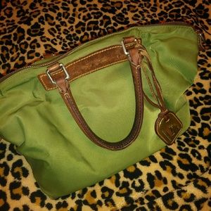 Dooney & Bourke army green with pink in the inside